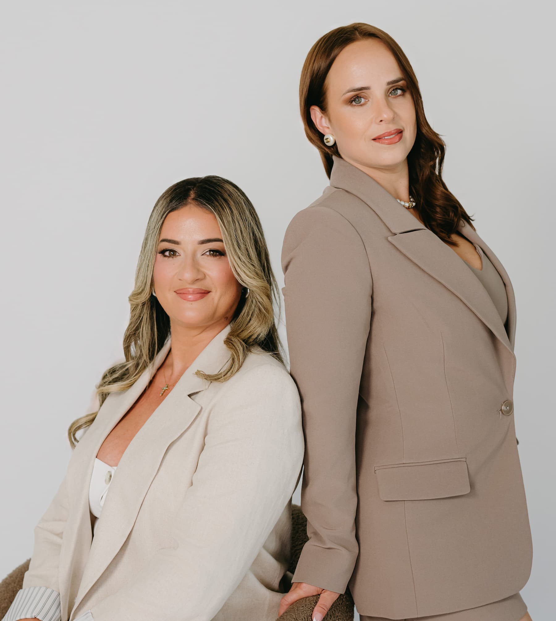 Attorneys Claudia Perez and her partner in their law office