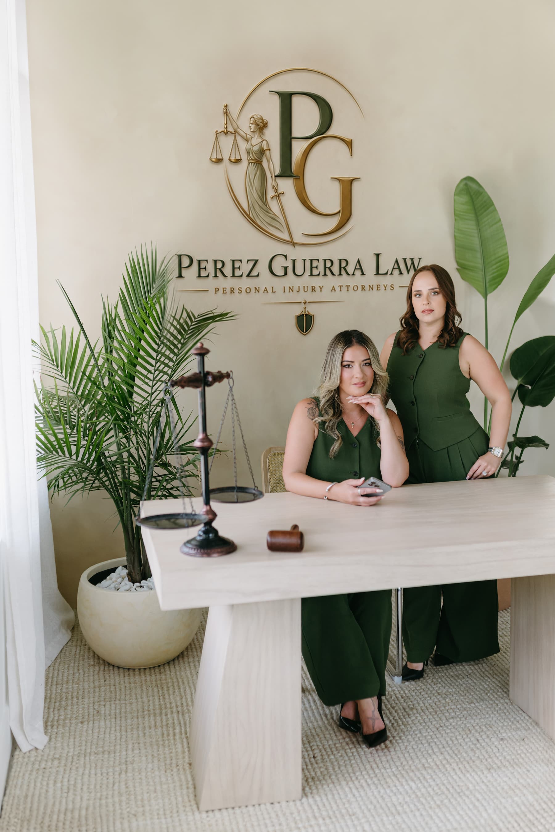 Attorney Claudia Perez reviewing a case with a client
